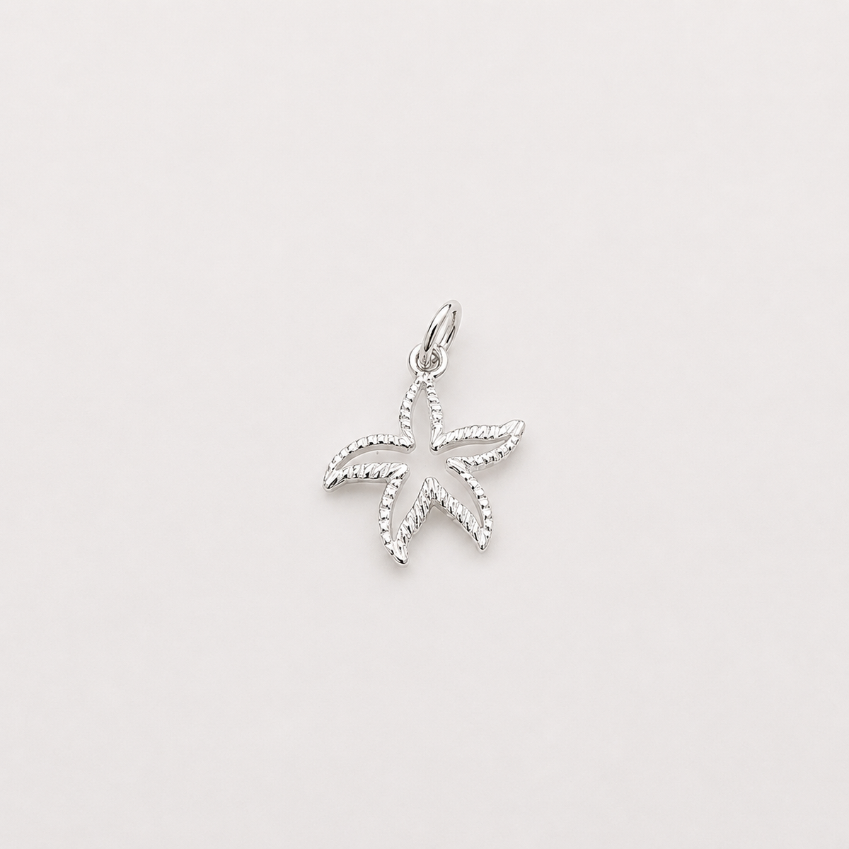 Cut Out Star Fish Charm - Sterling Silver