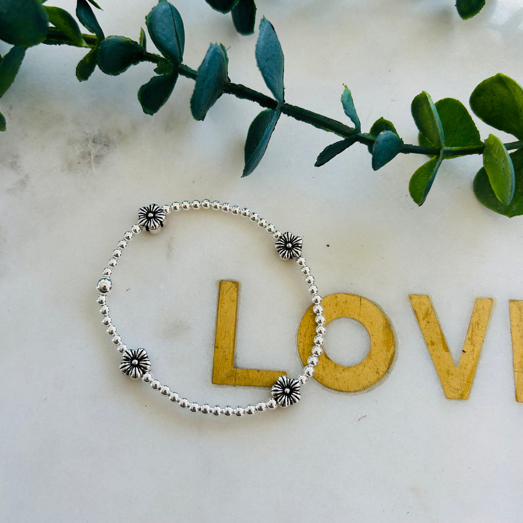 3mm Sterling Silver Bead Bracelet with Beautiful Daisy Spacers