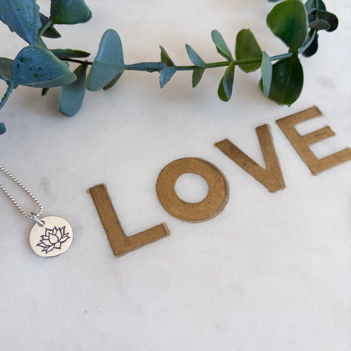 Sterling Lotus Engraved Disc