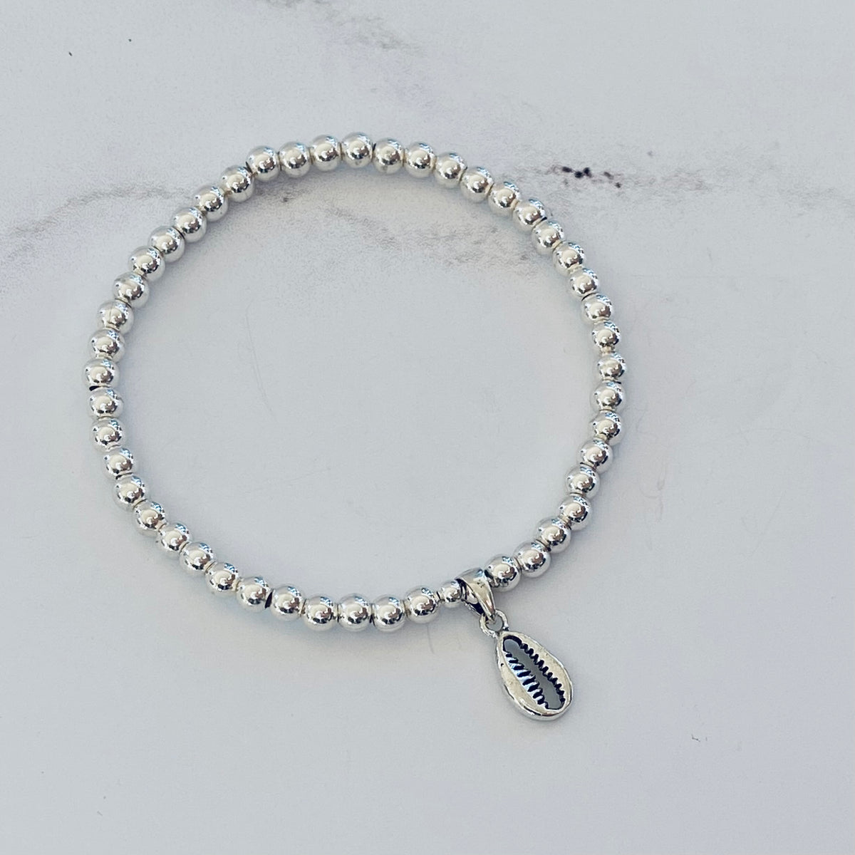 3mm Flat Cowrie Shell Bracelet – view 2
